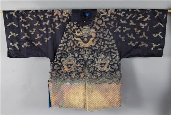 A Chinese midnight blue silk dragon robe, length 115cm